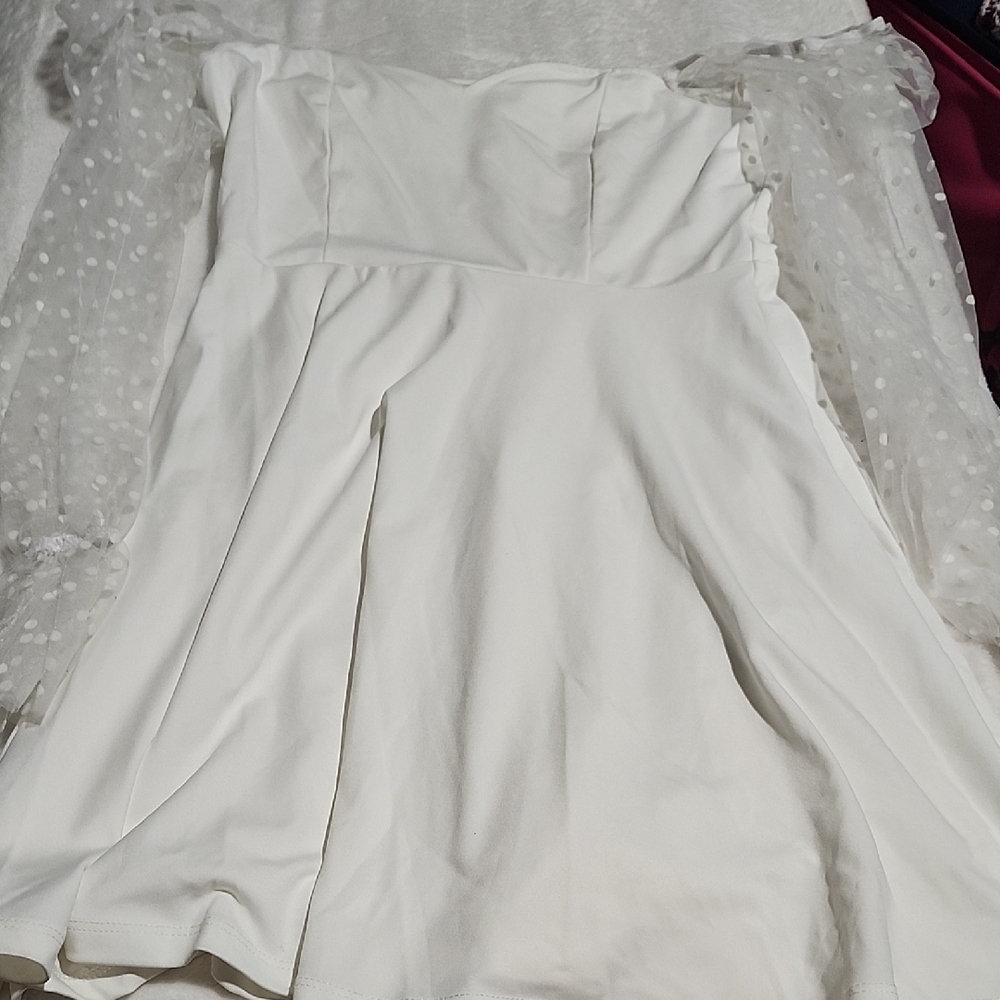 Elegant White Dress with Sheer Polka Dot Sleeves